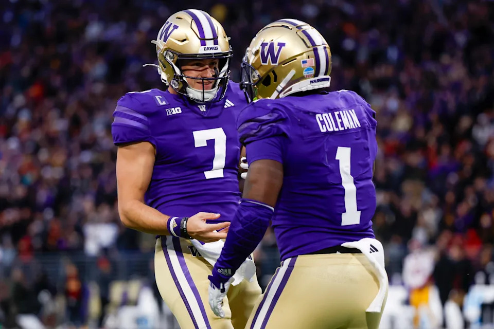 Nov 2, 2024; Seattle, Washington, USA; Washington Huskies quarterback Will Rogers (7) celebrates a rushing touchdown by running back Jonah Coleman (1) against the USC Trojans during the first quarter at Alaska Airlines Field at Husky Stadium. Mandatory Credit: Joe Nicholson-Imagn Images