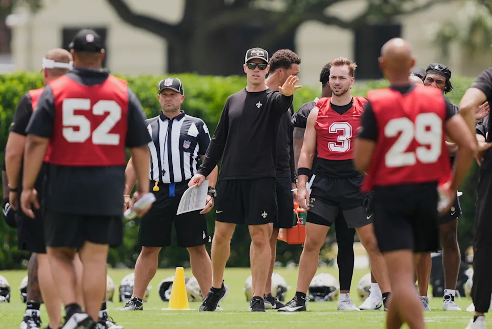 New Orleans Saints head coach Kellen Moore watches during practice at NFL football minicamp in Metairie, La., Tuesday, June 10, 2025. (AP Photo/Gerald Herbert)
