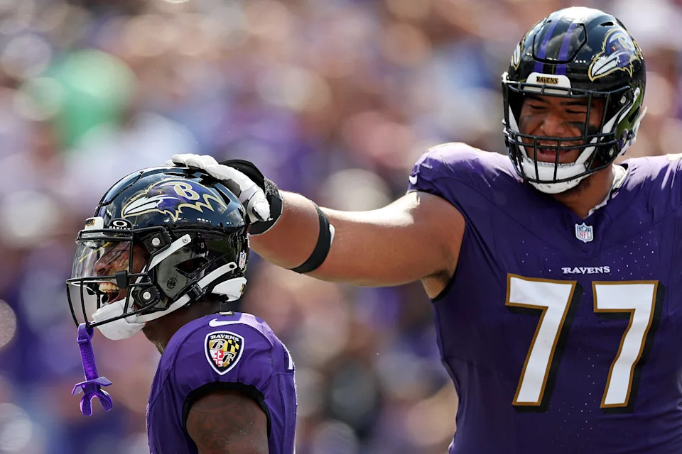 BALTIMORE, MARYLAND - SEPTEMBER 15: Zay Flowers #4 and Daniel Faalele #77 of the Baltimore Ravens celebrate a touchdown during the third quarter against the Las Vegas Raiders at M&T Bank Stadium on September 15, 2024 in Baltimore, Maryland. (Photo by Patrick Smith/Getty Images)