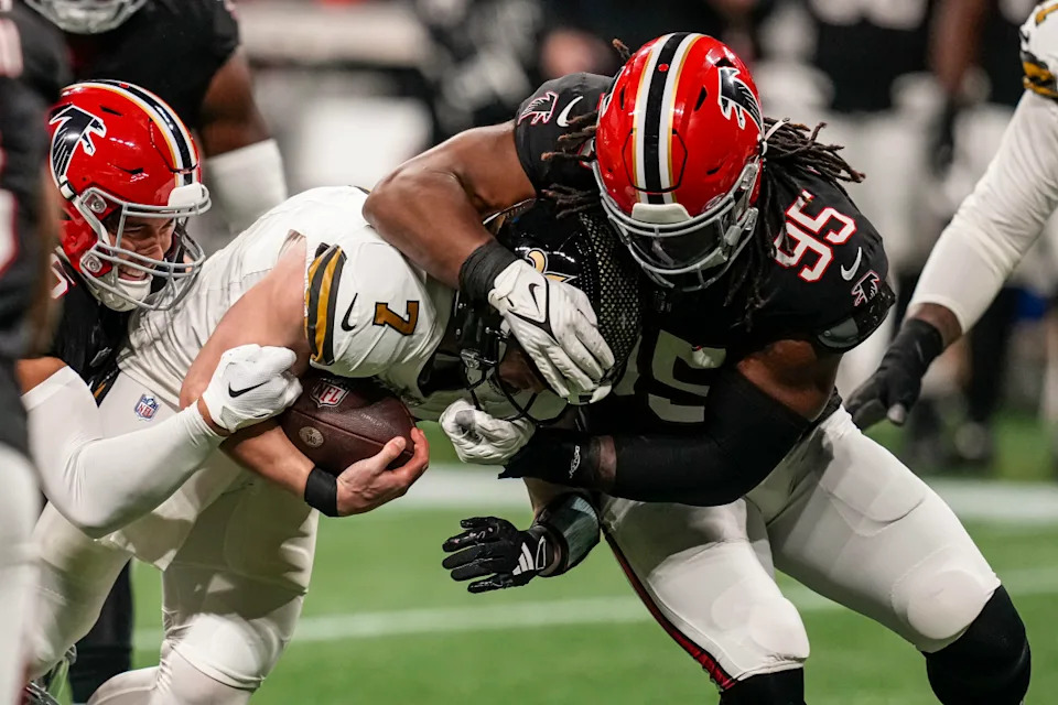 Falcons DT Ta'Quon Graham makes a tackle against the New Orleans Saints. Dale Zanine-Imagn Images