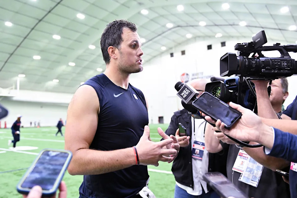 Jun 10, 2025; Foxborough, MA, USA; New England Patriots tight end Hunter Henry (85) speaks to the media after minicamp held in the WIN Field House at Gillette Stadium. Mandatory Credit: Eric Canha-Imagn Images