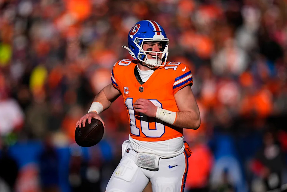 Denver Broncos quarterback Bo Nix (10) during the first quarter against the Kansas City Chiefs at Empower Field at Mile High.Ron Chenoy-Imagn Images