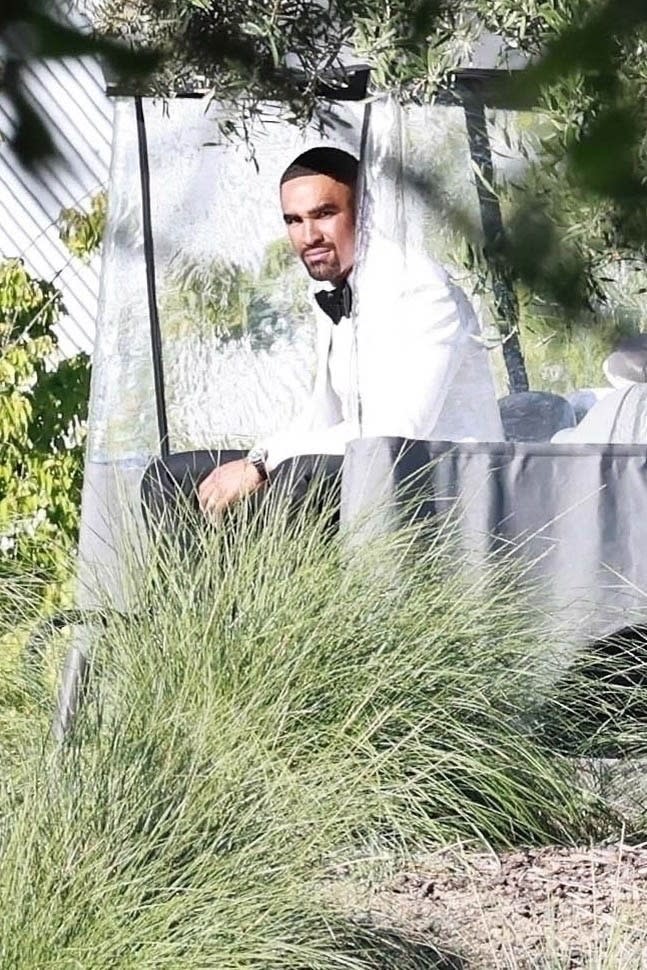 Eagles quarterback Jalen Hurts looks on during his wedding weekend in June 2025. BACKGRID
