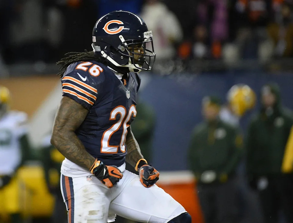 Dec 29, 2013; Chicago, IL, USA; Chicago Bears cornerback Tim Jennings (26) reacts after a play against the Green Bay Packers during the fourth quarter at Soldier Field. The Green Bay Packers win 33-28. Mandatory Credit: Mike DiNovo-USA TODAY Sports