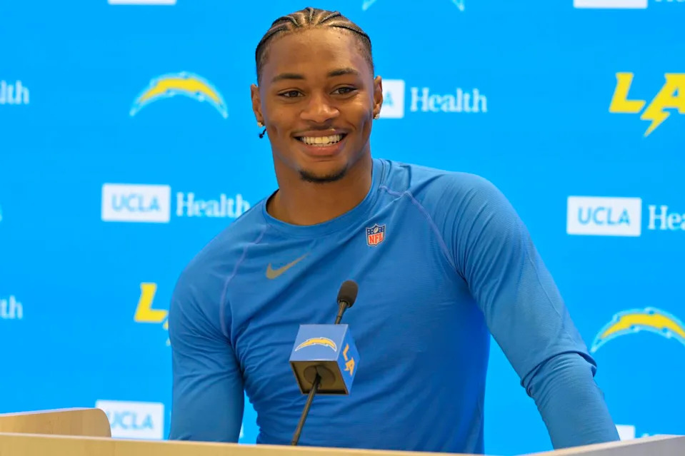 Chargers cornerback Tarheeb Still speaks during a news conference.