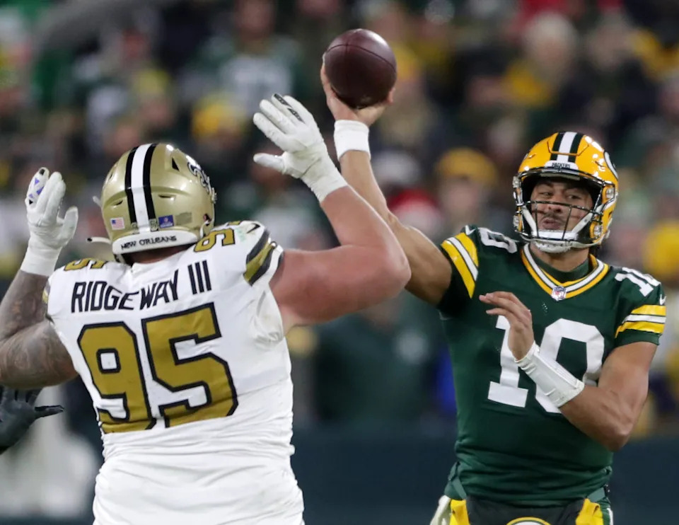 Dec 23, 2024; Green Bay Packers quarterback Jordan Love (10) throws under pressure from New Orleans Saints defensive tackle John Ridgeway III (95). Mandatory Credit: Wm. Glasheen USA TODAY NETWORK-Wisconsin/Imagn Images