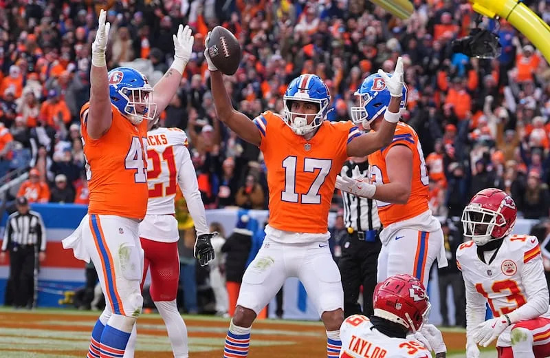 Denver Broncos wide receiver Devaughn Vele (17) gestures after catching a pass for a touchdown in the first half of an NFL football game Sunday, Jan. 5, 2025, in Denver. | David Zalubowski
