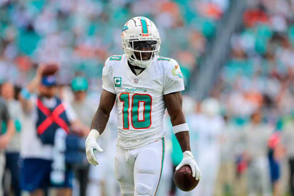 Miami Dolphins wide receiver Tyreek Hill (10) looks on after making a catch against the New York Jets during the first quarter at Hard Rock Stadium.Sam Navarro-Imagn Images