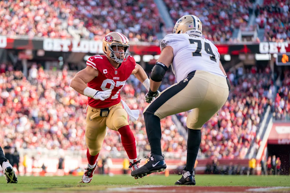 November 27, 2022; New Orleans Saints offensive tackle James Hurst (74) blocks San Francisco 49ers defensive end Nick Bosa (97). Mandatory Credit: Kyle Terada-Imagn Images