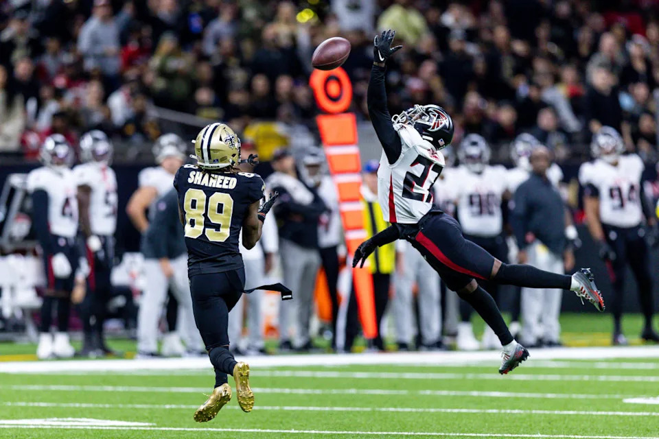 Dec 18, 2022; New Orleans Saints wide receiver Rashid Shaheed (89) catches a pass behind Atlanta Falcons safety Richie Grant (27). Mandatory Credit: Stephen Lew-Imagn Images