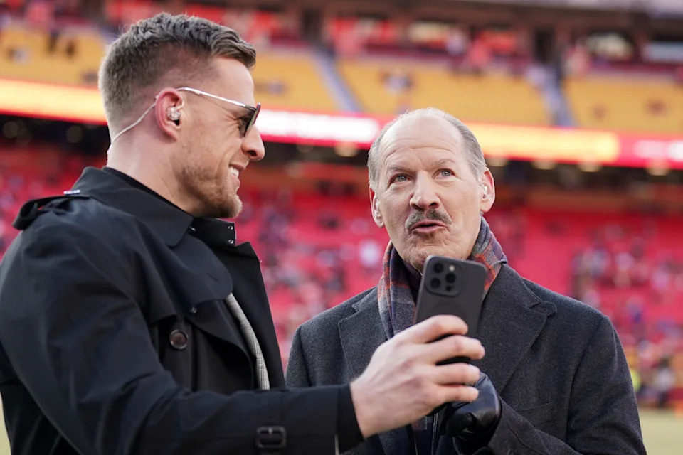 Former NFL player J.J. Watt and former coach Bill Cowher react on the field before the AFC Championship gameDenny Medley-Imagn Images