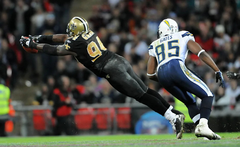 Oct. 26, 2008; London, ENGLAND; New Orleans Saints defensive end Charles Grant (94) bats the ball to force a punt during the third quarter of a regular season NFL International Series game against the San Diego Chargers at Wembley Stadium in London, England. Mandatory Credit: Kyle Terada-USA TODAY Sports