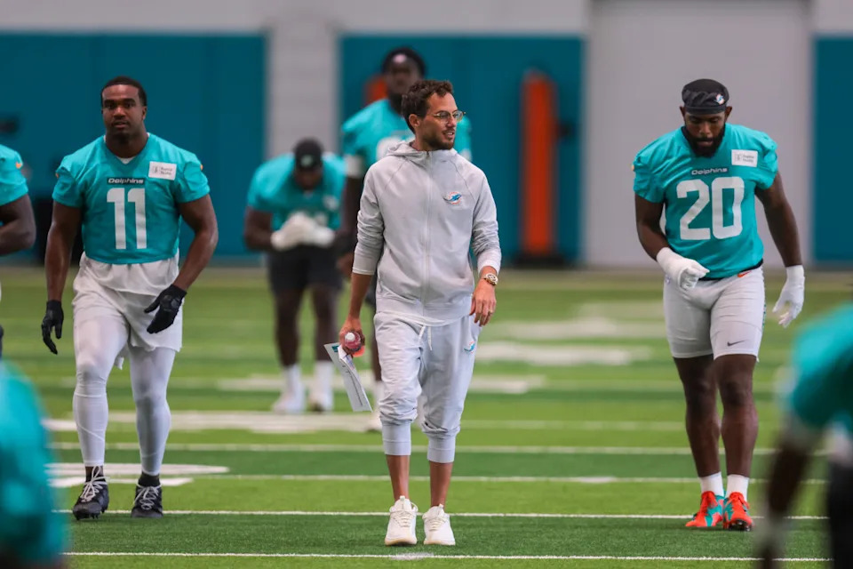 Miami Dolphins head coach Mike McDaniel watches practice during mandatory minicamp at Hard Rock Stadium.Sam Navarro-Imagn Images