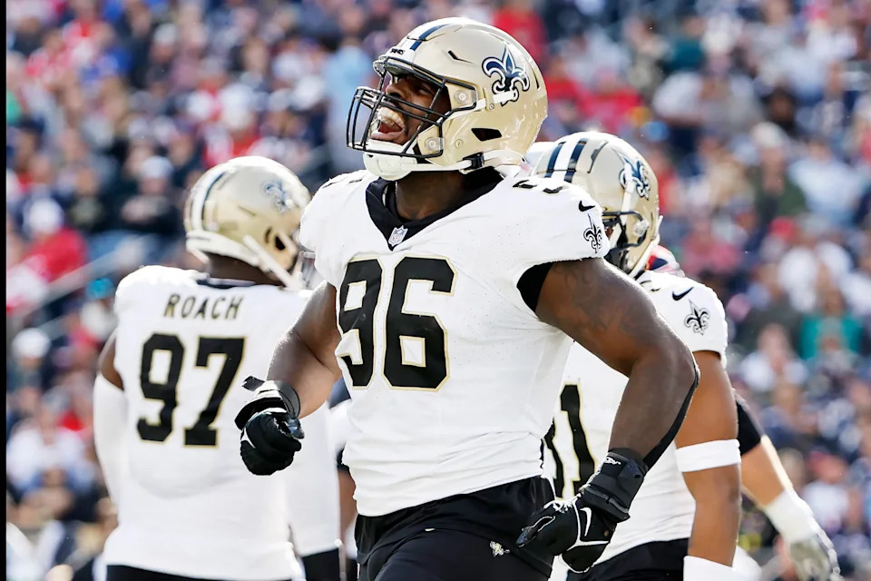 FOXBOROUGH, MASSACHUSETTS - OCTOBER 08: Carl Granderson #96 of the New Orleans Saints celebrates after a tackle for a loss during the third quarter against the New England Patriots at Gillette Stadium on October 08, 2023 in Foxborough, Massachusetts. (Photo by Winslow Townson/Getty Images)