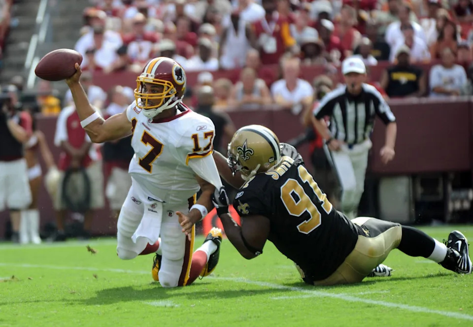 Sept 14, 2008; Washington Redskins quarterback Jason Campbell (17) is sacked by New Orleans Saints. Mandatory Credit: James Lang-Imagn Images