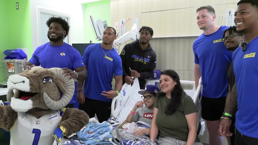 Rams players pose with patients during a visit to Cedars-Sinai on June 13, 2025. (Cedars-Sinai)