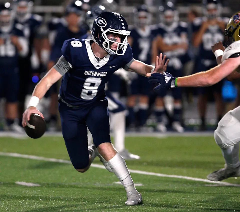 Greenwood's Kane Archer fends off a Pulaski Academy defender during the 5A West Conference game on Oct. 28 at Smith Robinson Stadium.
Greenwood Pul Acad Fb 102822 05