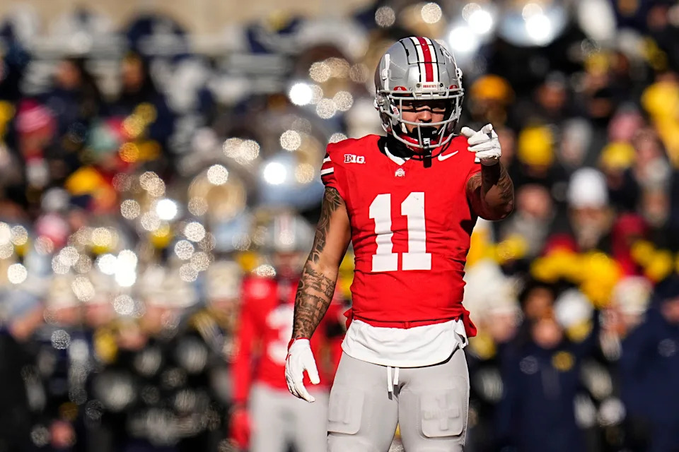 Ohio State Buckeyes wide receiver Brandon Inniss (11) lines up for a kickoff during the NCAA football game against the Michigan Wolverines at Ohio Stadium in Columbus on Tuesday, Dec. 3, 2024. Michigan won 13-10.