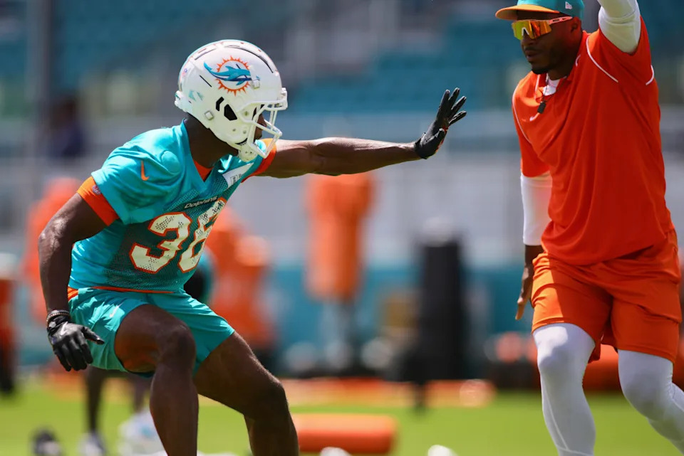 Miami Dolphins cornerback Storm Duck (36) works out during mandatory minicamp at Baptist Health Training Complex.Sam Navarro-Imagn Images