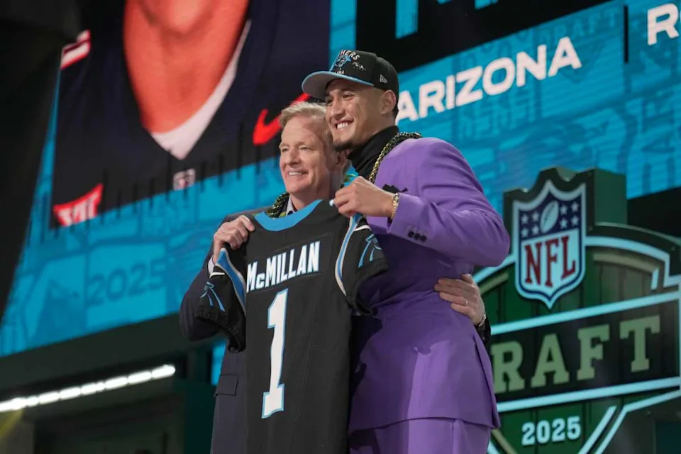 NFL Commissoner Rodger Goodell, left, with Arizona Wildcats wide receiver Tetairoa McMillan selected by the Carolina Panthers as the number eight pick in the first round of the 2025 NFL Draft at Lambeau Field.© Mark Hoffman / Milwaukee Journal Sentinel / USA TODAY NETWORK via Imagn Images