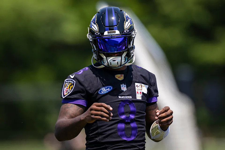 May 26, 2021; Owings Mills, Maryland, USA; Baltimore Ravens quarterback Lamar Jackson (8) looks on during an OTA at Under Armour Performance Center. Mandatory Credit: Scott Taetsch-USA TODAY Sports