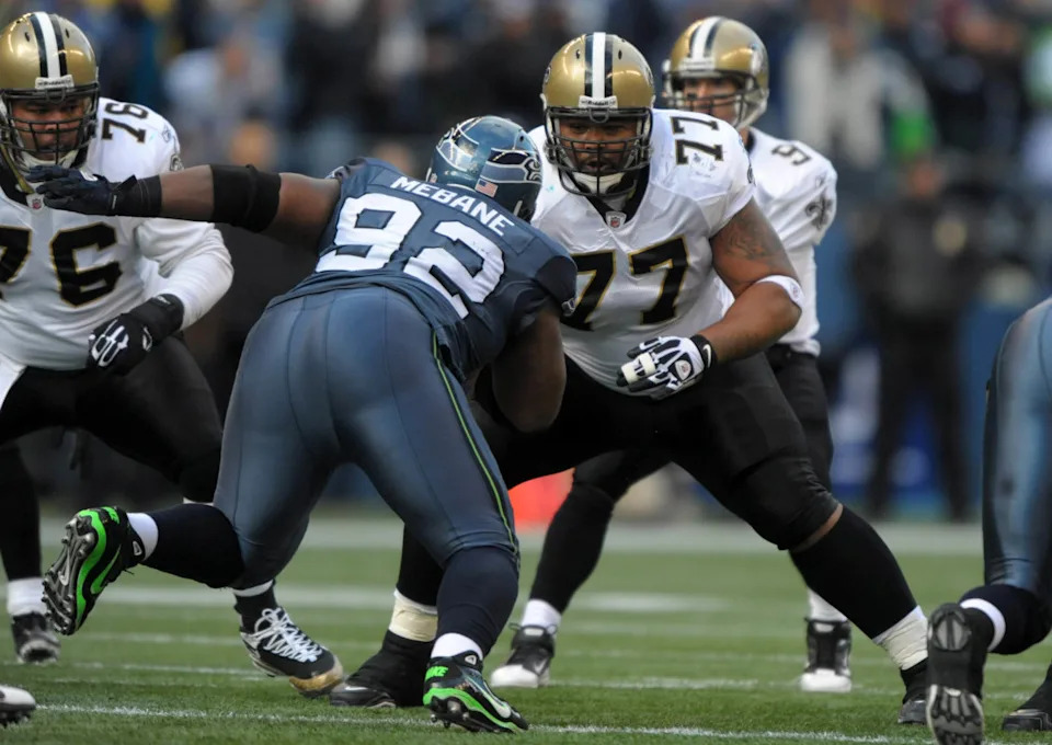 Jan 8, 2010; New Orleans Saints left guard Carl Nicks (77) blocks against Seattle Seahawks defensive tackle Brandon Mebrane (92) during the NFC Wild Card playoff game. Mandatory Credit: Kirby Lee/Image of Sport-Imagn Images