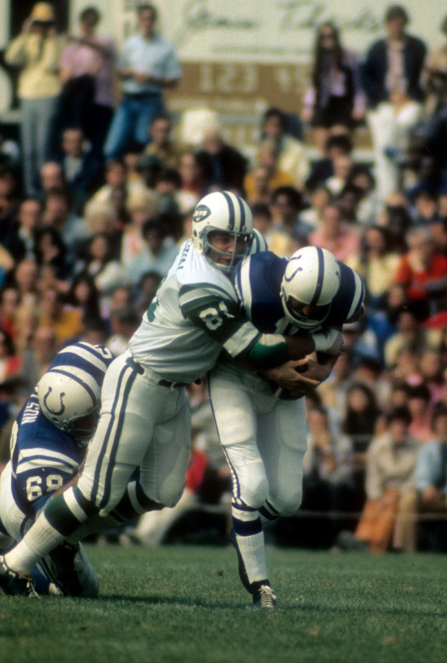 Photo of Gerry Philbin #81 of the New York Jets sacking Johnny Unitas #19 of the Baltimore Colts during Super Bowl III.