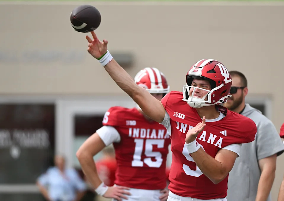 Aug 31, 2024; Bloomington, Indiana, USA; Indiana Hoosiers quarterback Kurtis Rourke (9) warms up prior to the game at Memorial Stadium. Mandatory Credit: Robert Goddin-USA TODAY Sports