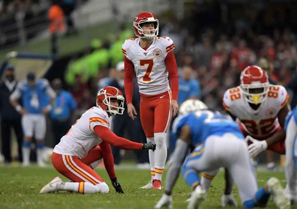 Kansas City Chiefs kicker Harrison Butker and punter Dustin ColquittKirby Lee-Imagn Images