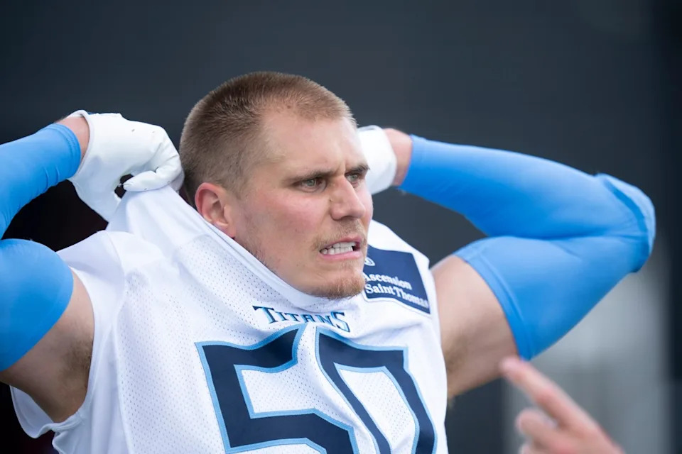 Tennessee Titans outside linebacker Cody Barton (50) removes his jersey after OTAs at Ascension Saint Thomas Sports Park in Nashville, Tenn., Tuesday, June 3, 2025.© Denny Simmons &sol; The Tennessean &sol; USA TODAY NETWORK via Imagn Images