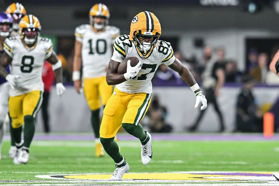 Green Bay Packers wide receiver Romeo Doubs (87) gets yards after the catch against the Minnesota Vikings during the fourth quarter at U.S. Bank Stadium.Jeffrey Becker-Imagn Images