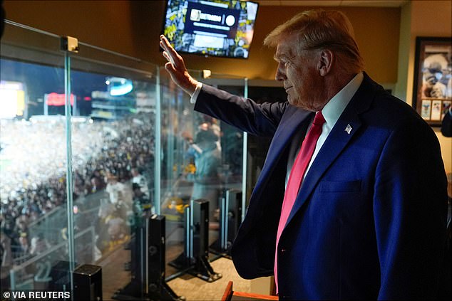 Trump waves to fans after arriving at the Jets-Steelers game in Pittsburgh back in October