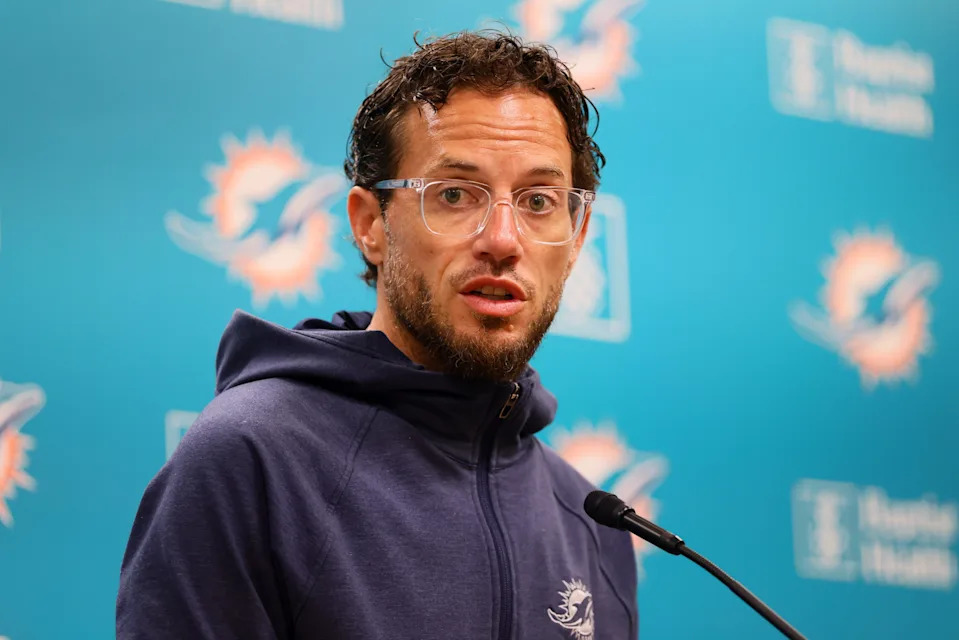 Aug 15, 2024; Miami Gardens, FL, USA; Miami Dolphins head coach Mike McDaniel talks to reporters before joint practice with the Washington Commanders at Baptist Health Training Complex. Mandatory Credit: Sam Navarro-USA TODAY Sports