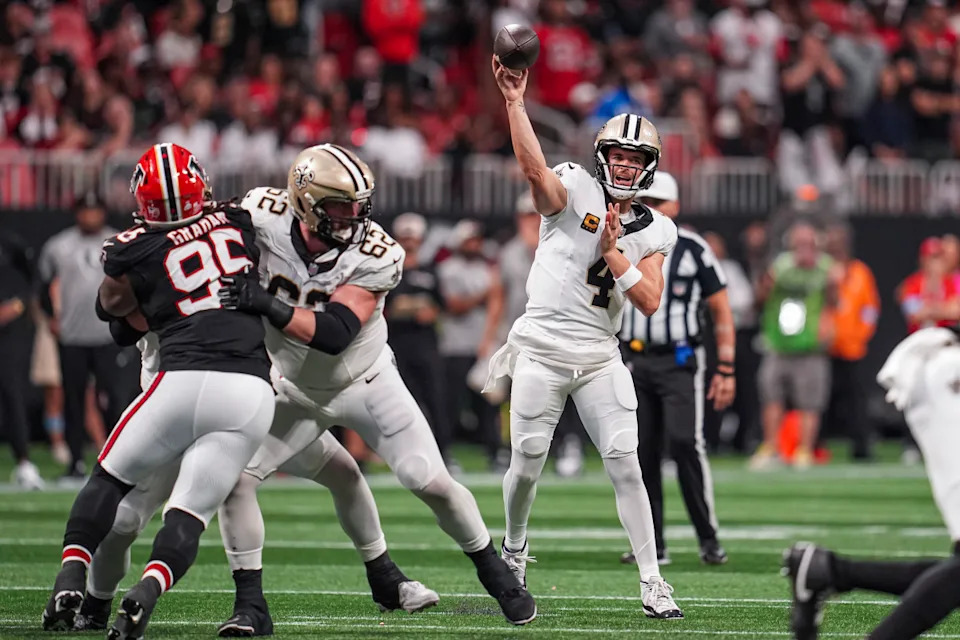 New Orleans Saints quarterback Derek Carr (4) passes the ball against the Atlanta Falcons. Mandatory Credit: Dale Zanine-Imagn Images