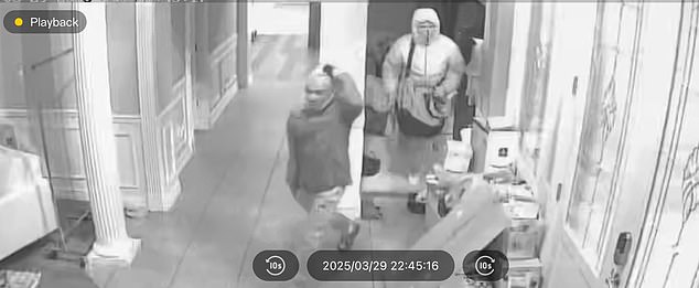 A time stamp on the footage shows the robbers entering the home on Saturday, March 29