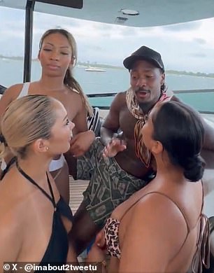 NFL wide receiver Stefon Diggs was seen surrounded by women clad in bikinis on Monday
