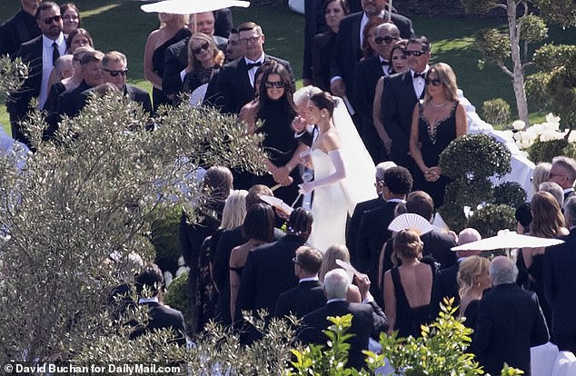 Exclusive DailyMail.com photos show the moment a beaming Steinfeld, 28, made her way up the aisle