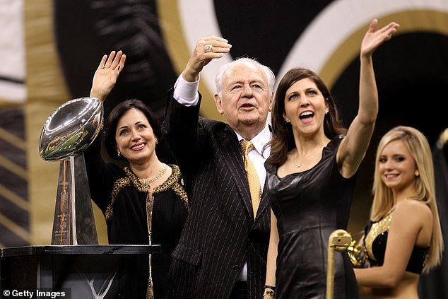 Team Owner of the New Orleans Saints Tom Benson, his wife Gayle and his daughter Rita Benson LeBlanc wave to fans alongside the team's lone Vince Lombardi Trophy in 2010