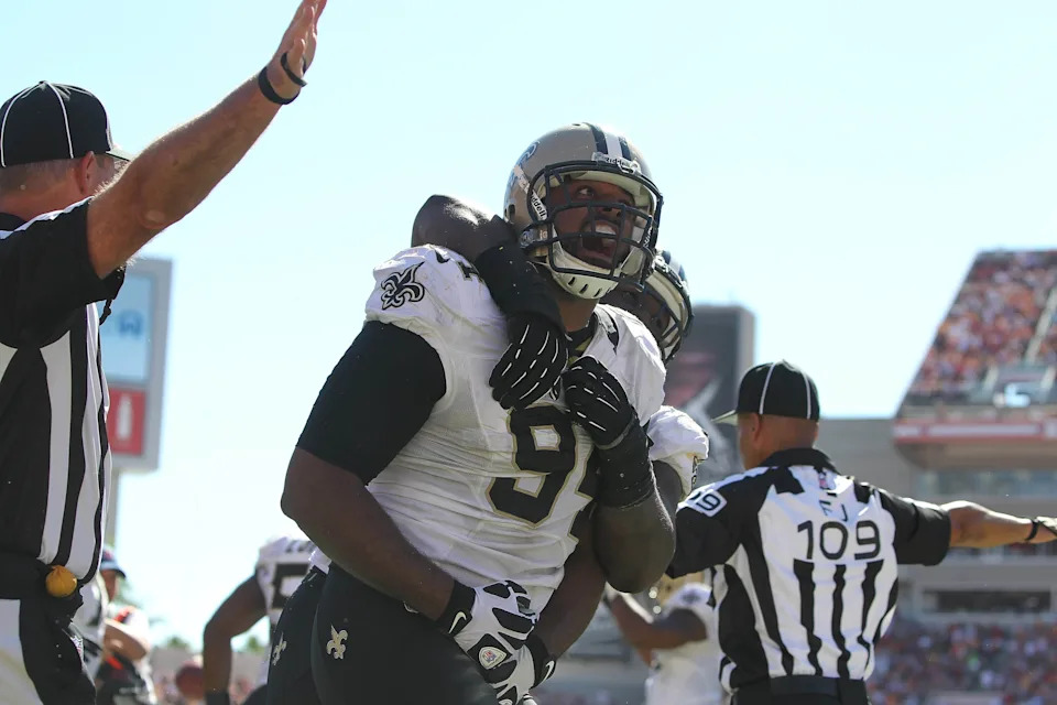 October 21, 2012; Tampa, FL, USA; New Orleans Saints defensive end Cameron Jordan (94) reacts after he stopped the Tampa Bay Buccaneers on fourth down and goal during the second half at Raymond James Stadium. New Orleans Saints defeated the Tampa Bay Buccaneers 35-28. Mandatory Credit: Kim Klement-USA TODAY Sports