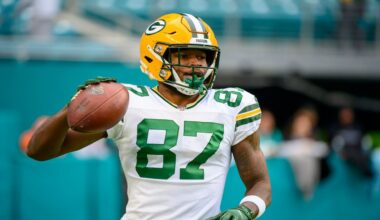 Green Bay Packers wide receiver Romeo Doubs (87) holds a football on the field before an NFL football game against the Miami Dolphins, Sunday, Dec. 25, 2022, in Miami Gardens, Fla.