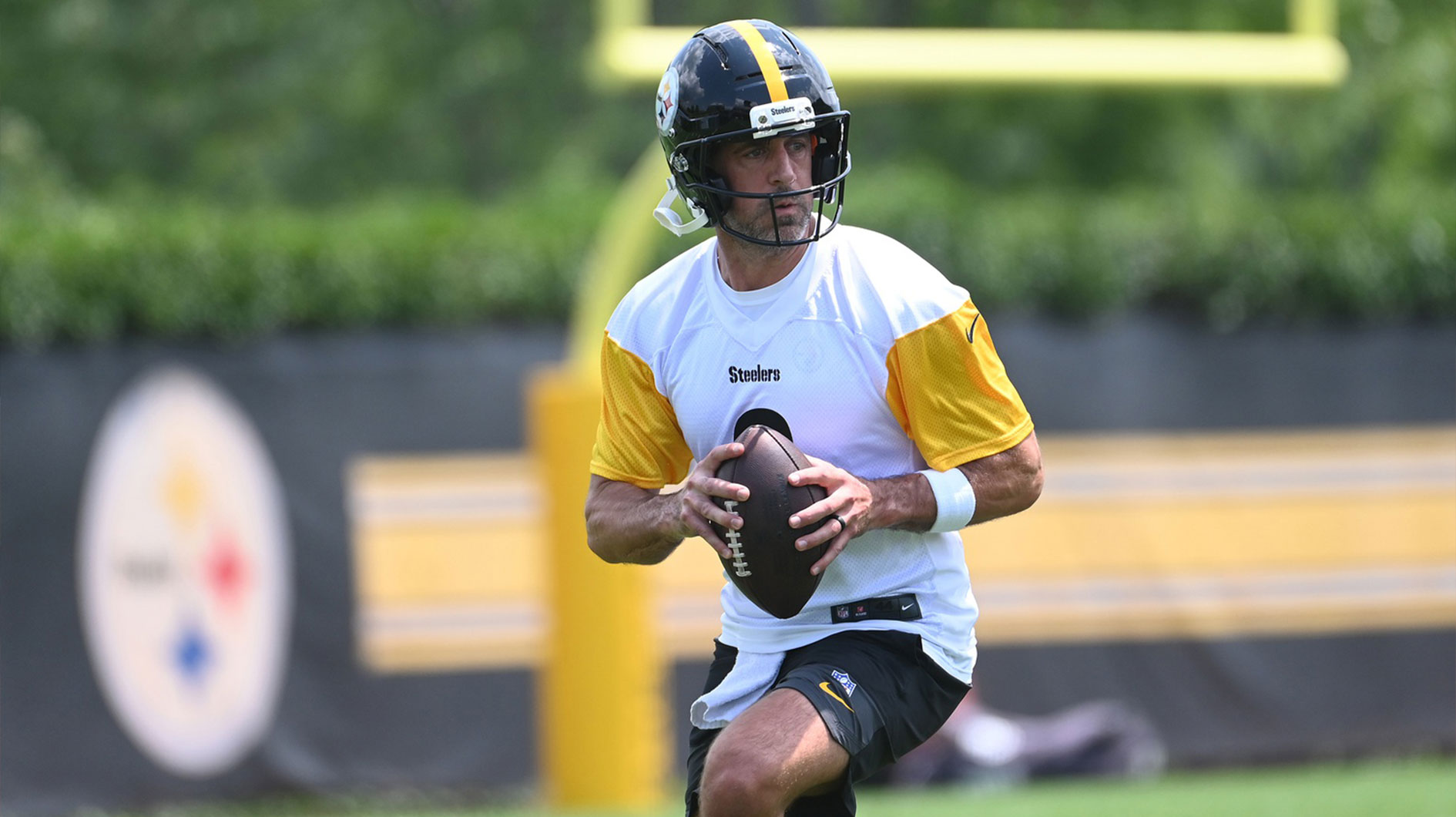 Jun 10, 2025; Pittsburgh, PA, USA; Pittsburgh Steelers quarterback Aaron Rodgers (8) drops back to pass during minicamp at their South Side facility. 