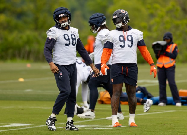 Bears defensive end Montez Sweat (98) and defensive tackle Gervon Dexter Sr. (99) practice Wednesday, May 28, 2025, at Halas Hall. (Brian Cassella/Chicago Tribune)