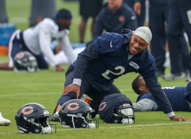 Wide receiver DJ Moore laughs as he stretches during Bears minicamp at Halas Hall on June 4, 2025, in Lake Forest. (Stacey Wescott/Chicago Tribune)