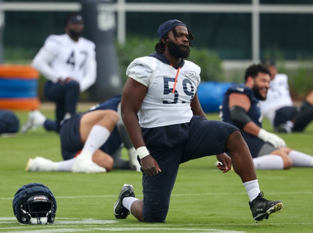 Defensive end Jamree Kromah stretches during Bears minicamp at Halas Hall on June 4, 2025, in Lake Forest. (Stacey Wescott/Chicago Tribune)