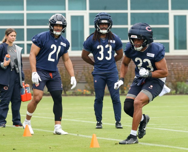 Running back Roschon Johnson catches the ball and turns upfield during Bears minicamp at Halas Hall on June 4, 2025, in Lake Forest. (Stacey Wescott/Chicago Tribune)