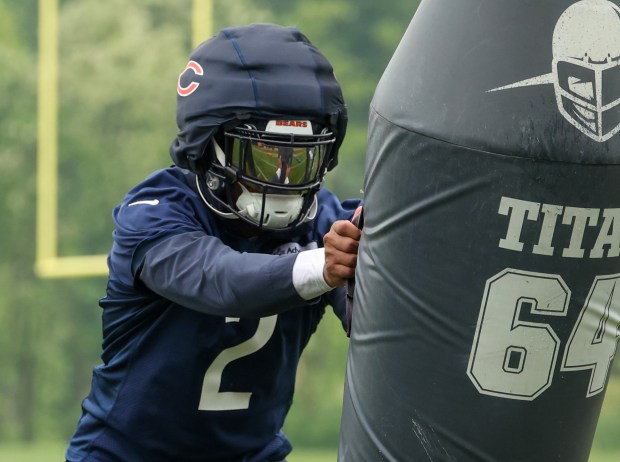 Wide receiver DJ Moore moves through blocking drills during Bears minicamp at Halas Hall on June 4, 2025, in Lake Forest. (Stacey Wescott/Chicago Tribune)