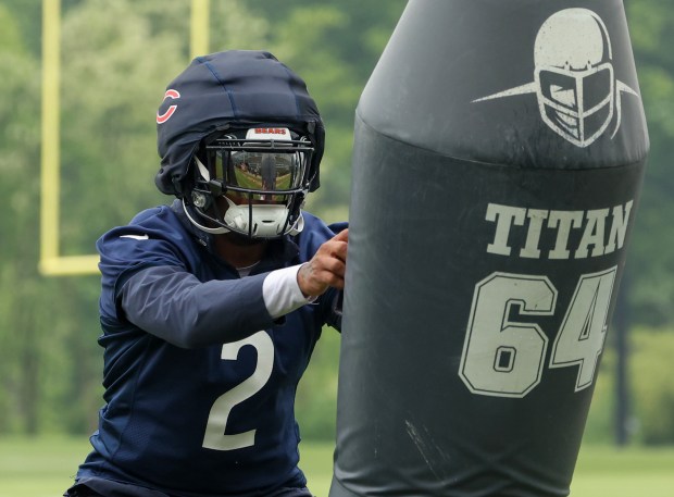 Wide receiver DJ Moore moves through blocking drills during Bears minicamp at Halas Hall on June 4, 2025, in Lake Forest. (Stacey Wescott/Chicago Tribune)