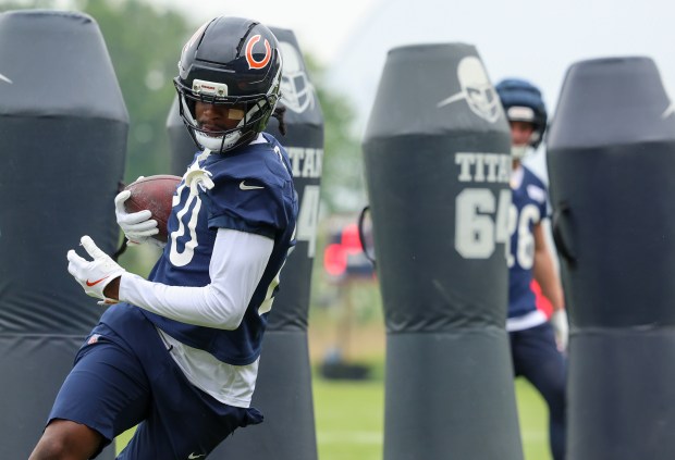 Wide receiver Jahdae Walker catches the ball and turns upfield during Bears minicamp at Halas Hall on June 4, 2025, in Lake Forest. (Stacey Wescott/Chicago Tribune)