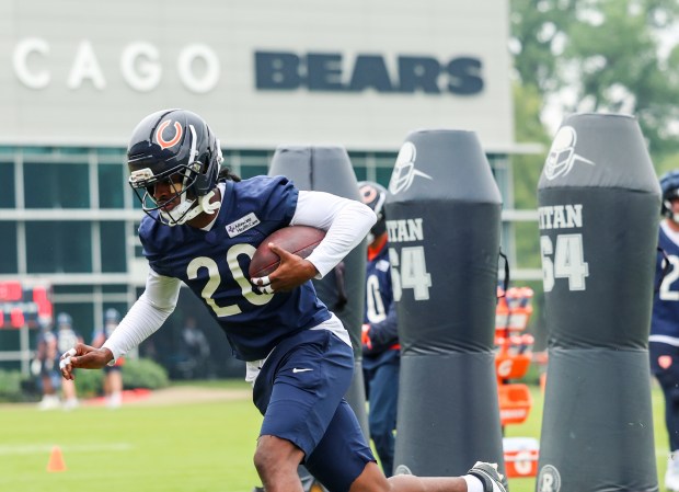 Wide receiver Jahdae Walker catches the ball and turns upfield during Bears minicamp at Halas Hall on June 4, 2025, in Lake Forest. (Stacey Wescott/Chicago Tribune)