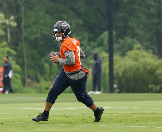 Quarterback Caleb Williams runs through drills during Bears minicamp at Halas Hall on June 4, 2025, in Lake Forest. (Stacey Wescott/Chicago Tribune)